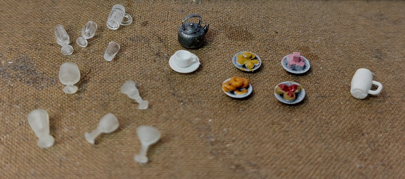 quelques verres mais aussi, il faudra penser au thé! - ou au café... bon, je le reconnais j'ai des tasses à thé, pas à café... pourtant la taille n'est pas la même... la maladie mentale a quand même des limites! ;--)